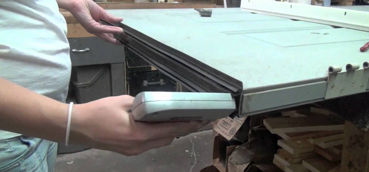 damaged steel door repair Mayflower Village